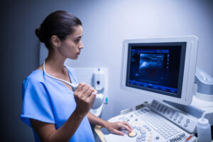 nurse-using-ultrasonic-device